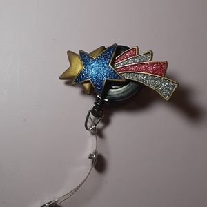 Retractable name badge holder